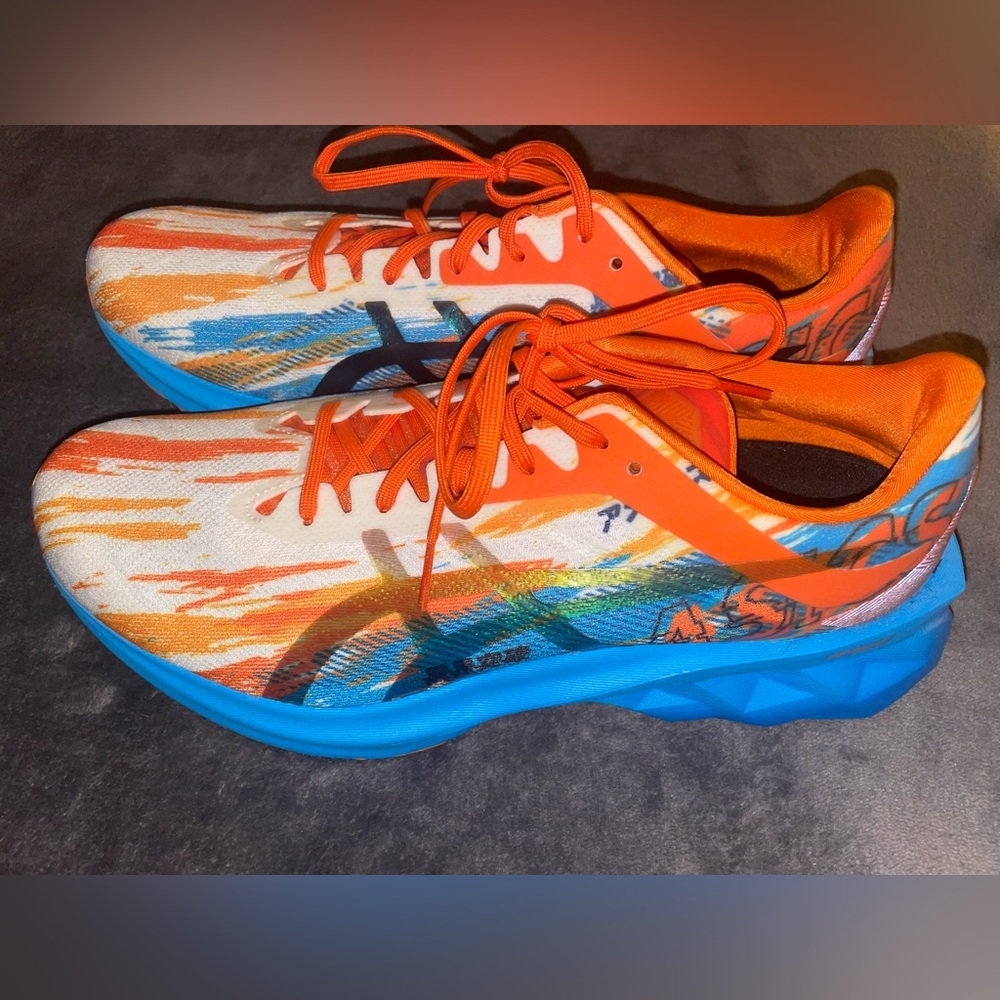 ASICS Novablast running shoes. Size 10. Multicolored blue/orange. Never worn